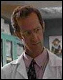 Доктор Табаш (Тед Руни) - хирург-консультант послеродового отделения. 